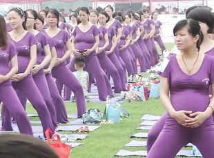 Pregnant Asian women doing yoga (non porn)