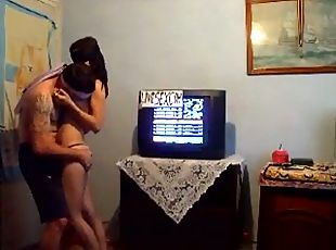 Blindfolded sex by the TV